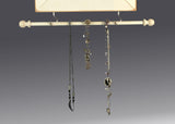 Jewelry hanging from Jewelry bar - Earring Holder Gallery