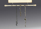 Jewelry hanging from Jewelry bar - Earring Holder Gallery