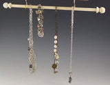  Jewelry Bar with jewelry hanging from a Jewelry Cabinet - Earring Holder Gallery  
