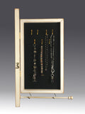 Earring Holder & Jewelry Organizer Cabinet with door open showing necklaces hanging from jewelry hooks inside. A removable jewelry bar is hanging from the bottom of the case.   Earring Holder Gallery  