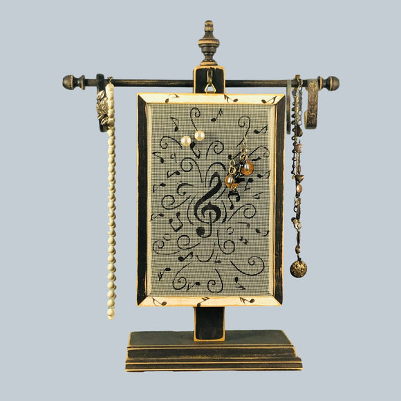 Classic earring holder hanging on a necklace stand  - Music Notes Design - by Earring Holder Gallery